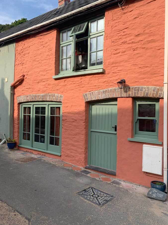 Red Beeck Silicate Masonry Paint on Small stone Cottage House