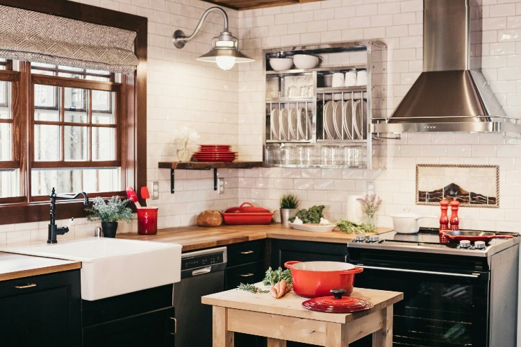 clean mould free kitchen - dark cabinets, wood worktop, red features