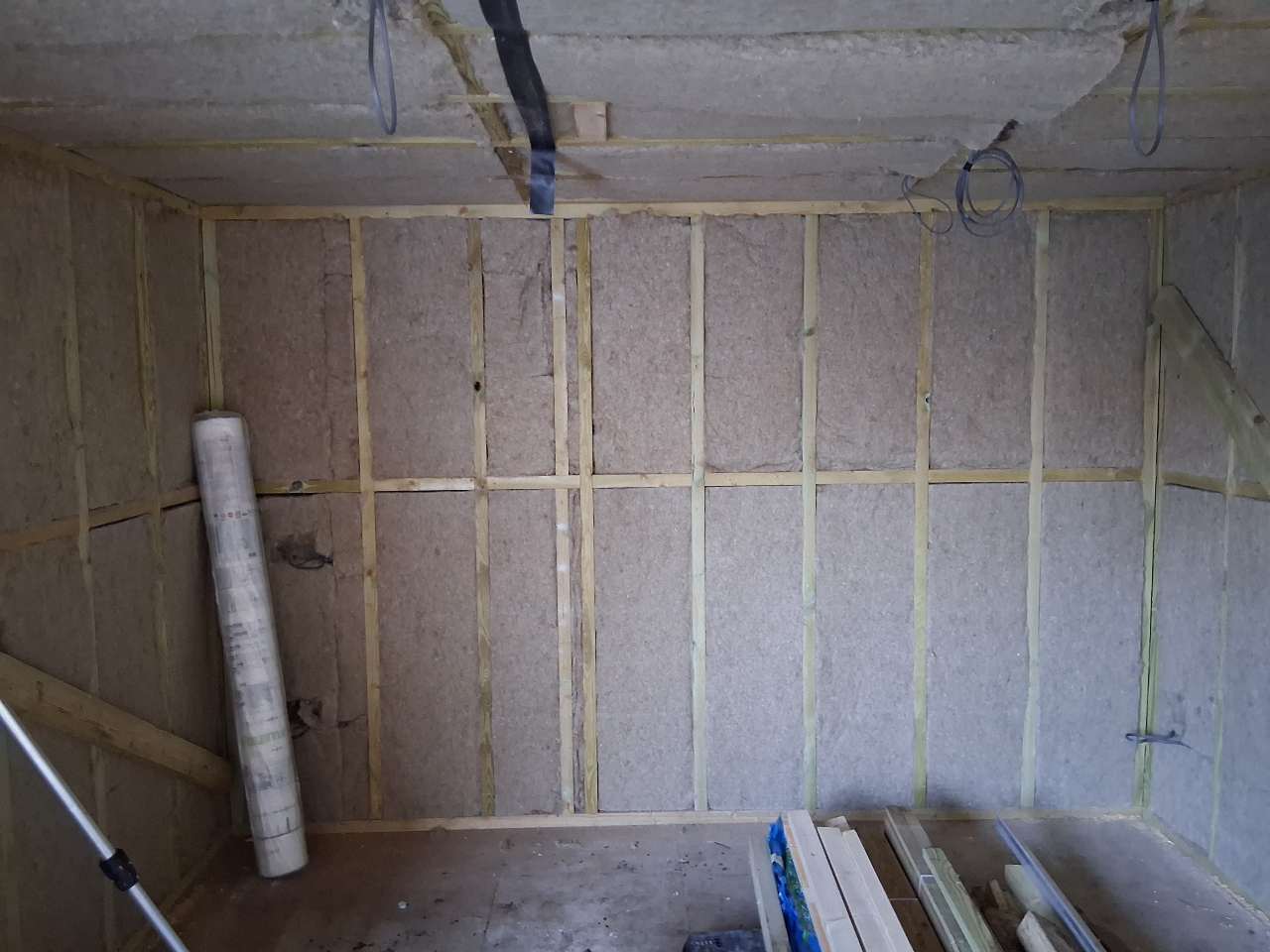 IndiNature Hemp Insulation being installed in a garden room with intello membrane