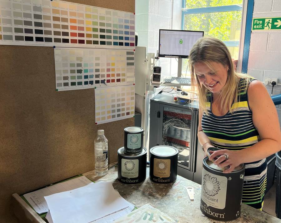 Sarah at Celtic Sustainables mixing Earthborn Claypaint