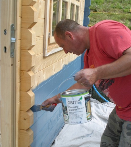 The Cwtch Summer Houses painted with Blue Outdoor Wood Paint